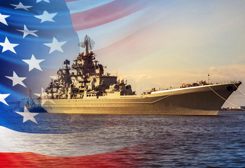 military ship with american flag faded on top