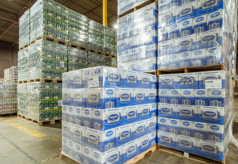 palettes of beer boxes in warehouse